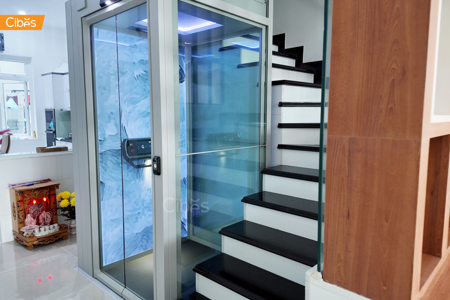 Phường Xóm Chiếu, Tp HCM - Thang máy Cibes lắp đặt giữa thang bộ trong không gian sống hiện đại4